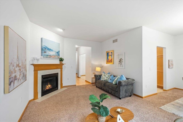 3869 Maple Grove Dr, Madison, WI 53719 - carpeted living area featuring a fireplace with flush hearth and baseboards
