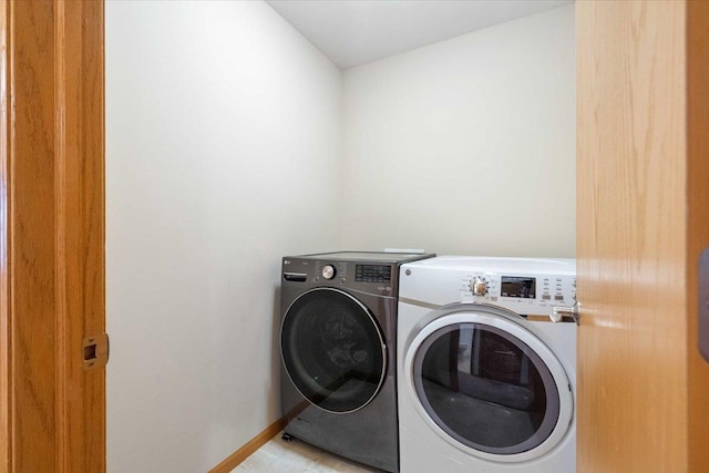 3869 Maple Grove Dr, Madison, WI 53719 - washroom featuring independent washer and dryer and baseboards