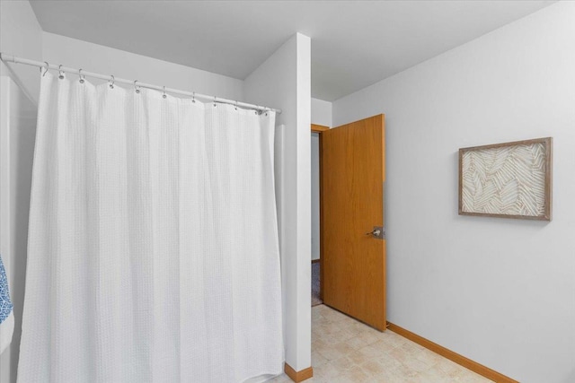 3869 Maple Grove Dr, Madison, WI 53719 - full bath with curtained shower and tile patterned floors