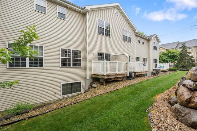 3869 Maple Grove Dr, Madison, WI 53719 - back of house with a lawn and a wooden deck