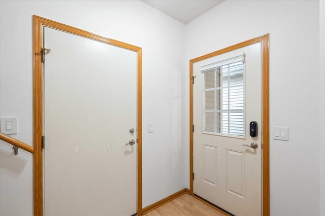 3869 Maple Grove Dr, Madison, WI 53719 - doorway to outside with light wood-style floors and baseboards