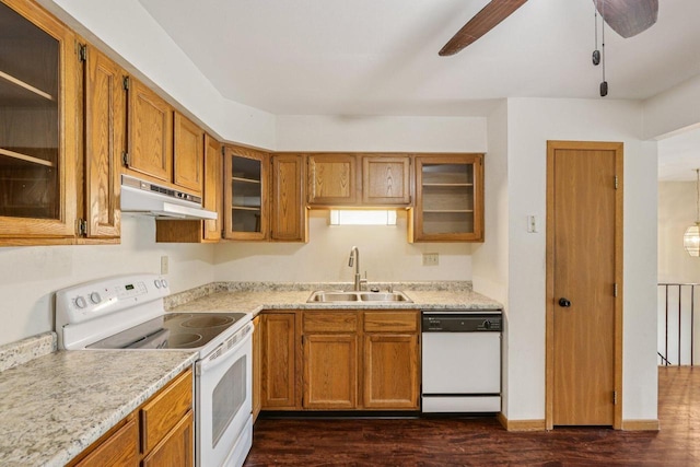 10268 W Parkedge Cir, Franklin, WI 53132 - kitchen with white appliances, under cabinet range hood, brown cabinets, and light countertops