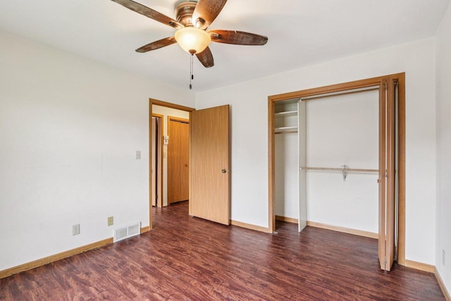 10268 W Parkedge Cir, Franklin, WI 53132 - unfurnished bedroom featuring dark wood-style floors, a closet, and a ceiling fan