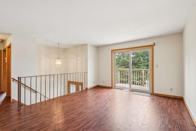 10268 W Parkedge Cir, Franklin, WI 53132 - spare room featuring wood finished floors and baseboards