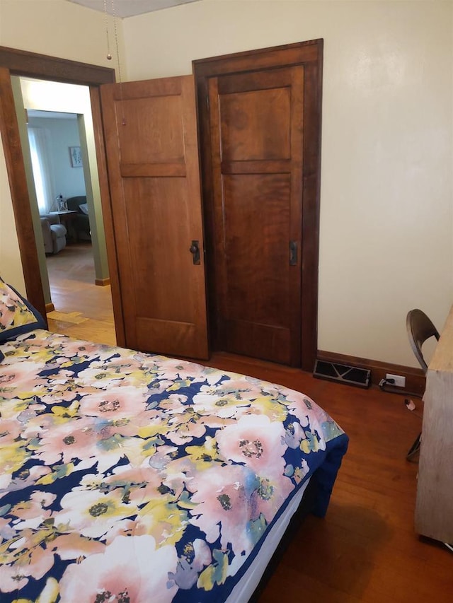 809 N 5th Ave, Wausau, WI 54401 - bedroom with light wood-type flooring and a closet