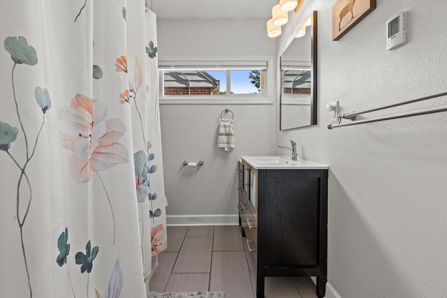150 E Fairmount Ave, Whitefish Bay, WI 53217 - bathroom with vanity and a shower with curtain