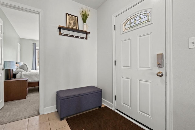 150 E Fairmount Ave, Whitefish Bay, WI 53217 - foyer entrance featuring light tile patterned floors and light colored carpet
