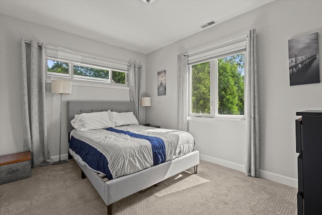 150 E Fairmount Ave, Whitefish Bay, WI 53217 - carpeted bedroom with multiple windows