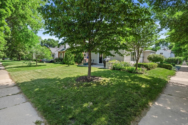 150 E Fairmount Ave, Whitefish Bay, WI 53217 - obstructed view of property featuring a front yard