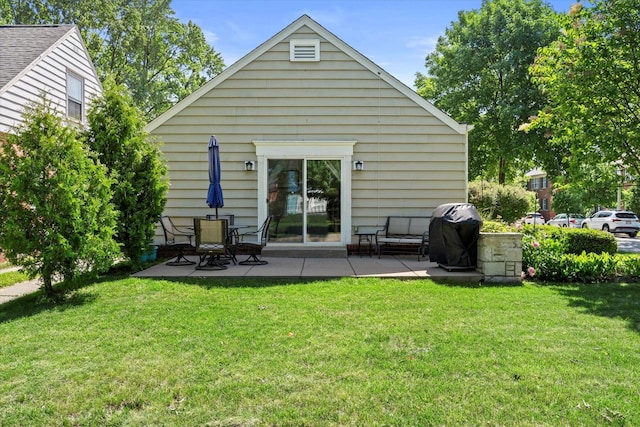 150 E Fairmount Ave, Whitefish Bay, WI 53217 - back of property featuring a patio area and a yard