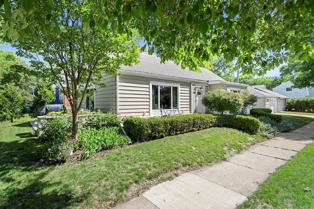 150 E Fairmount Ave, Whitefish Bay, WI 53217 - view of front of property with a front lawn and a garage