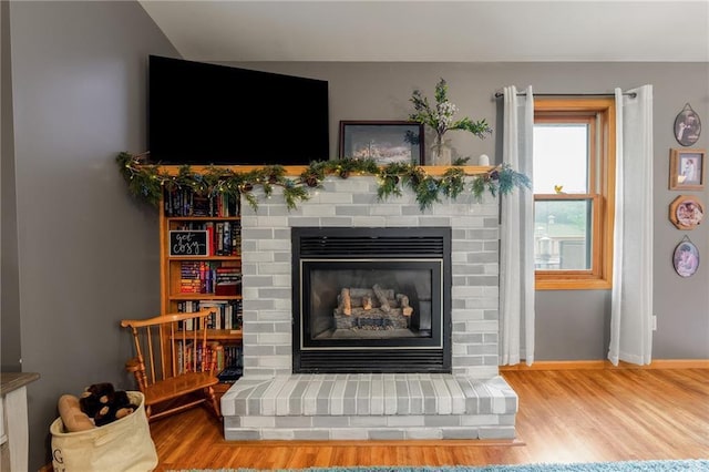 10525 Voight Rd, Fall Creek, WI 54742 - detailed view of wood finished floors and a fireplace