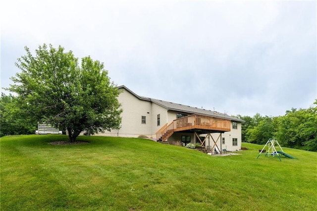 10525 Voight Rd, Fall Creek, WI 54742 - back of house with stairs, a deck, and a yard