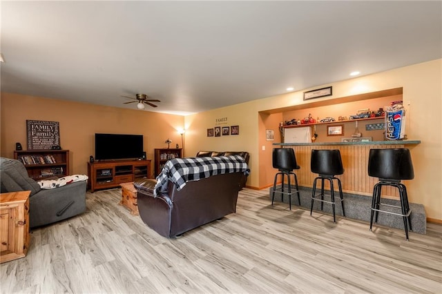 10525 Voight Rd, Fall Creek, WI 54742 - living area featuring a ceiling fan, wood finished floors, a bar, and recessed lighting