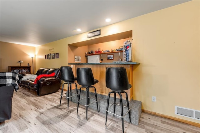 10525 Voight Rd, Fall Creek, WI 54742 - indoor dry bar with light wood-type flooring and recessed lighting
