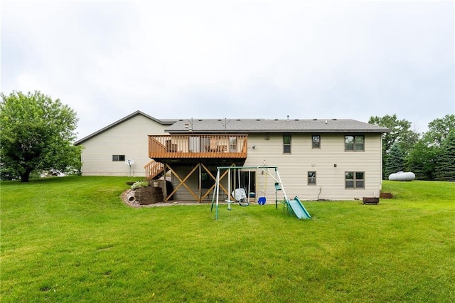 10525 Voight Rd, Fall Creek, WI 54742 - back of house with a wooden deck, stairs, a yard, and a playground