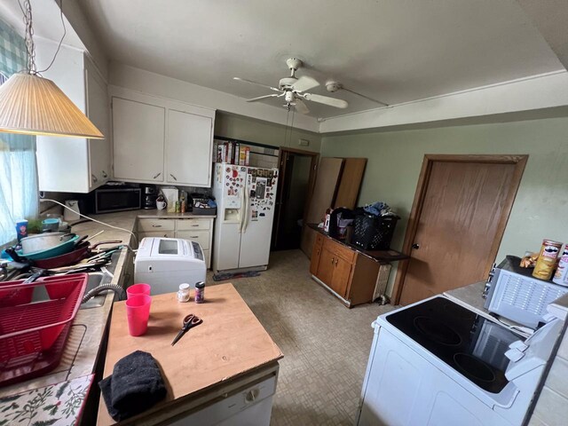 3671 E Plankinton Ave Unit 3673, Cudahy, WI 53110 - kitchen with white appliances, ceiling fan, white cabinetry, light countertops, and pendant lighting