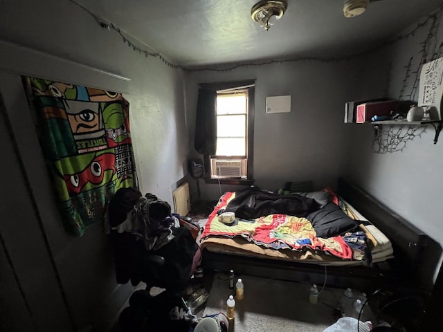 3671 E Plankinton Ave Unit 3673, Cudahy, WI 53110 - bedroom with cooling unit and radiator heating unit
