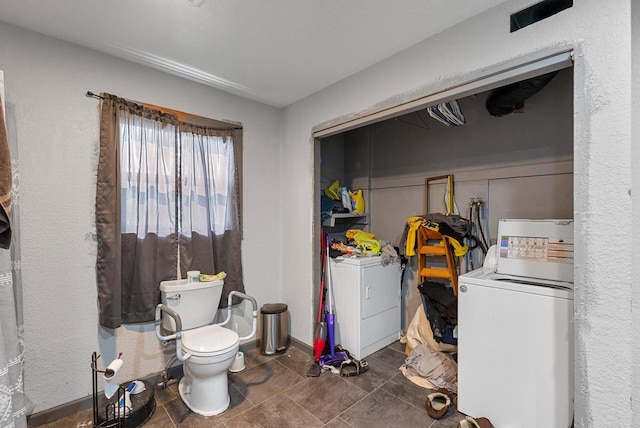 N7082 Airport Rd, Beaver Dam, WI 53916 - washroom featuring washing machine and dryer and tile patterned flooring
