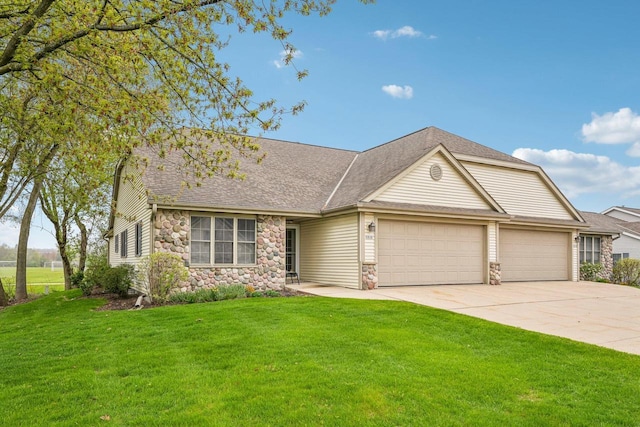 1910 Cedar St, Grafton, WI 53024 - view of front of house with a garage, stone siding, concrete driveway, a front lawn, and a shingled roof