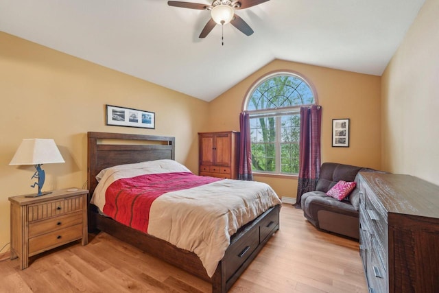 1910 Cedar St, Grafton, WI 53024 - bedroom with lofted ceiling, light wood-style floors, and a ceiling fan