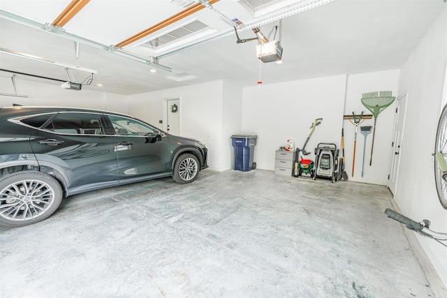 3717 White Pine Dr, Janesville, WI 53545 - garage with a garage door opener