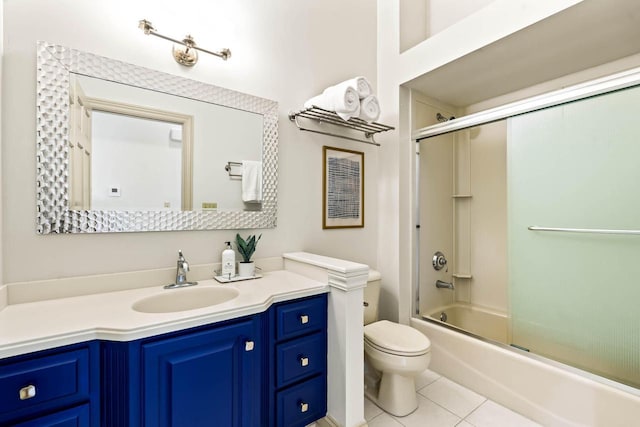N53W16527 Whitetail Run, Menomonee Falls, WI 53051 - bathroom featuring vanity, tile patterned floors, and bath / shower combo with glass door