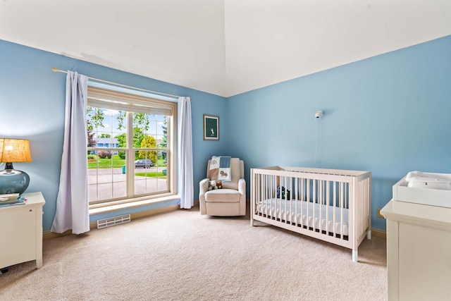 N53W16527 Whitetail Run, Menomonee Falls, WI 53051 - bedroom with carpet floors, a nursery area, and vaulted ceiling