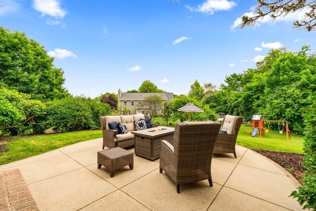 N53W16527 Whitetail Run, Menomonee Falls, WI 53051 - view of patio featuring an outdoor living space with a fire pit and a playground