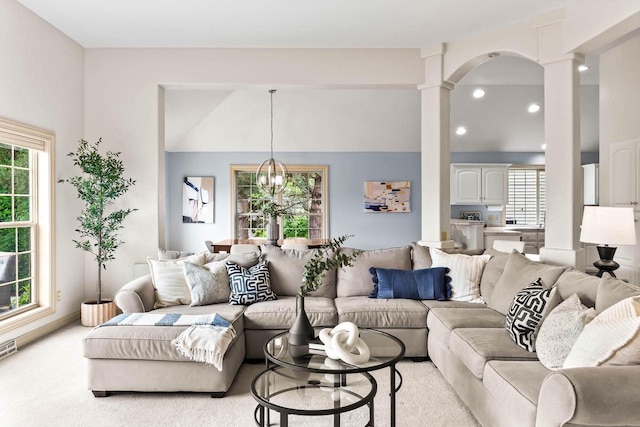 N53W16527 Whitetail Run, Menomonee Falls, WI 53051 - living room with lofted ceiling, healthy amount of natural light, decorative columns, a chandelier, and recessed lighting