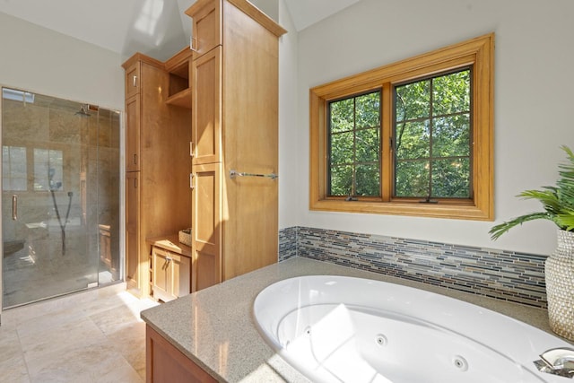 13835 Stonefield Ct, Elm Grove, WI 53122 - full bath with a shower stall, a whirlpool tub, and vanity
