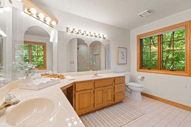 13835 Stonefield Ct, Elm Grove, WI 53122 - full bathroom with double vanity, a tile shower, and tile patterned flooring