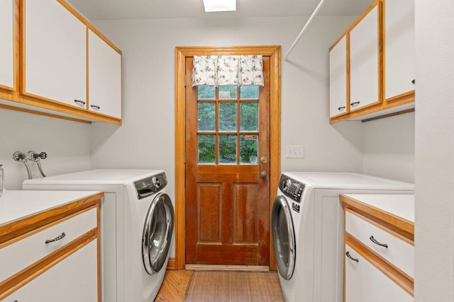 13835 Stonefield Ct, Elm Grove, WI 53122 - laundry area featuring cabinet space and washer and dryer
