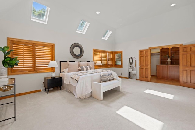 13835 Stonefield Ct, Elm Grove, WI 53122 - bedroom with a skylight, high vaulted ceiling, multiple windows, carpet, and a closet