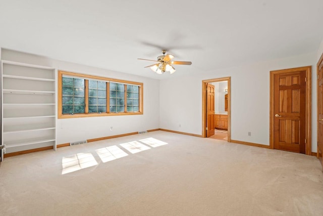 13835 Stonefield Ct, Elm Grove, WI 53122 - empty room with a ceiling fan and light colored carpet