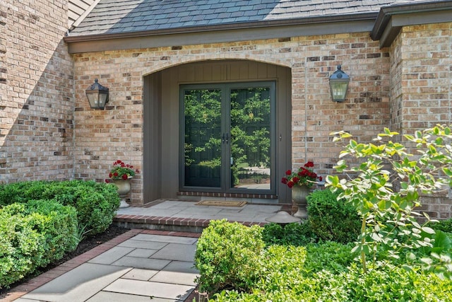 13835 Stonefield Ct, Elm Grove, WI 53122 - view of exterior entry with french doors and brick siding