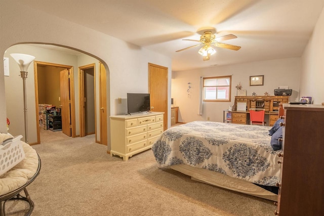 N3315 Brook Dr, Medford, WI 54451 - bedroom featuring arched walkways, light colored carpet, and a ceiling fan