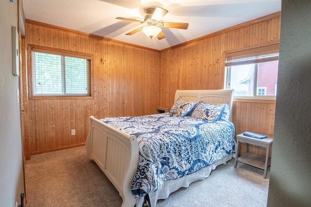N3315 Brook Dr, Medford, WI 54451 - bedroom featuring wooden walls, crown molding, light carpet, and ceiling fan