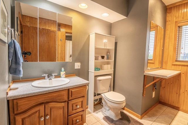 N3315 Brook Dr, Medford, WI 54451 - bathroom with tile patterned flooring, vanity, and wooden walls