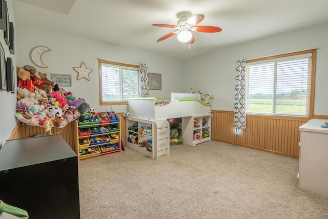 N3315 Brook Dr, Medford, WI 54451 - bedroom with a wainscoted wall, carpet, a ceiling fan, and wooden walls
