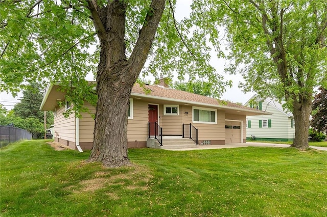 2336 Hayden Ave, Altoona, WI 54720 - view of front of house with a chimney and a garage