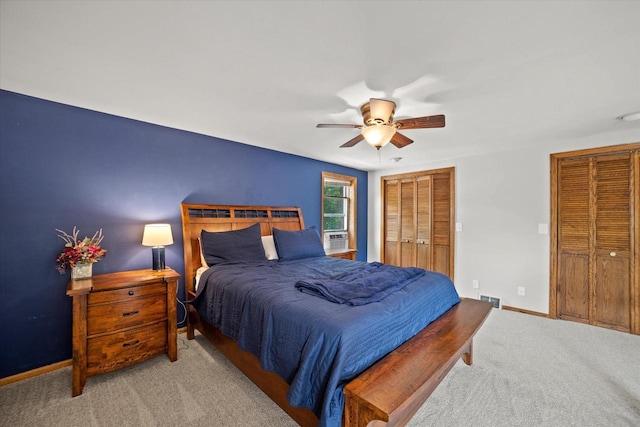 165 N 72nd St, Milwaukee, WI 53213 - carpeted bedroom featuring two closets and a ceiling fan