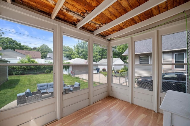 165 N 72nd St, Milwaukee, WI 53213 - sunroom / solarium with plenty of natural light, a residential view, and beam ceiling