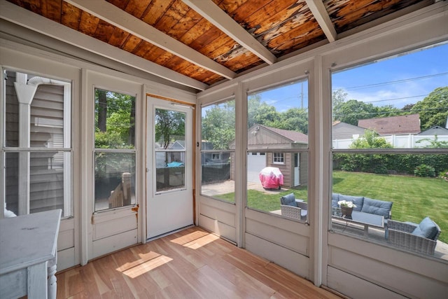 165 N 72nd St, Milwaukee, WI 53213 - sunroom with beamed ceiling and an outdoor living space