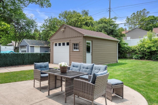 165 N 72nd St, Milwaukee, WI 53213 - view of patio / terrace featuring a detached garage, an outbuilding, and outdoor dining area
