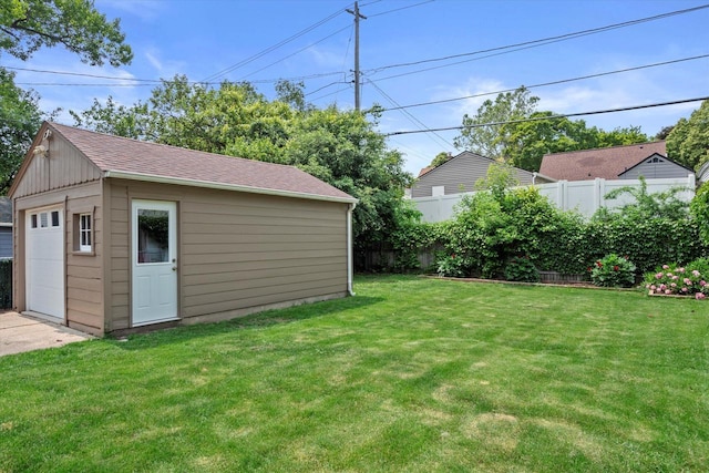 165 N 72nd St, Milwaukee, WI 53213 - view of yard with an outdoor structure and a detached garage