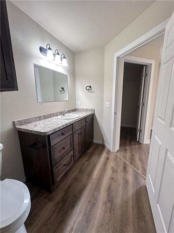 308 Dunn St, Colfax, WI 54730 - bathroom with wood finished floors and vanity