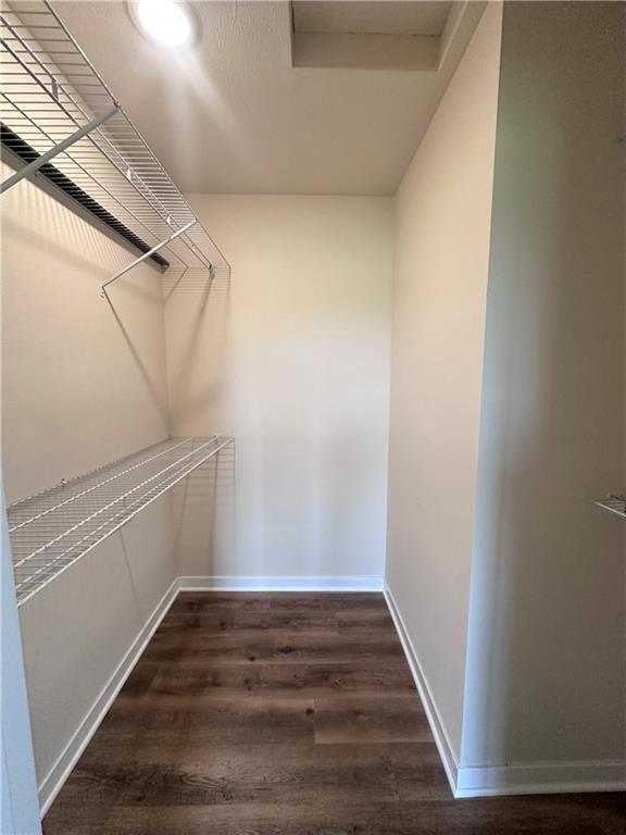 308 Dunn St, Colfax, WI 54730 - spacious closet featuring wood finished floors
