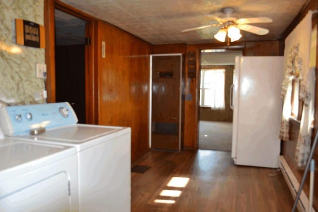 653 Grant St, Wonewoc, WI 53968 - laundry room with separate washer and dryer, a ceiling fan, and wood finished floors