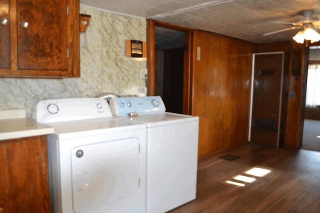 653 Grant St, Wonewoc, WI 53968 - washroom with independent washer and dryer, a ceiling fan, wood finished floors, and cabinet space